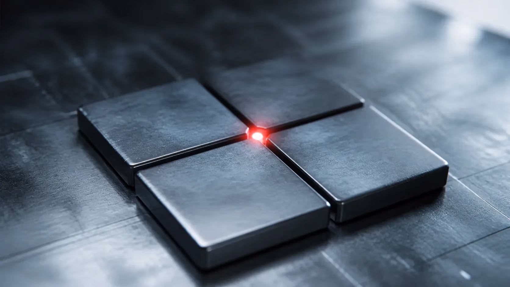 "Quattro tessere metalliche allineate con luce rossa centrale: le condizioni di PMax"